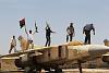 0-libyan-rebels-fighting-forces-moammar-gadhafi-libyan-conflict-airport-jets-fighter-7-.jpg